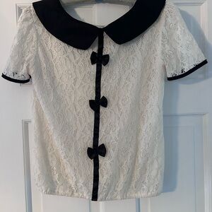 Lace lined Blouse with Black bows down back Peter Pan collar